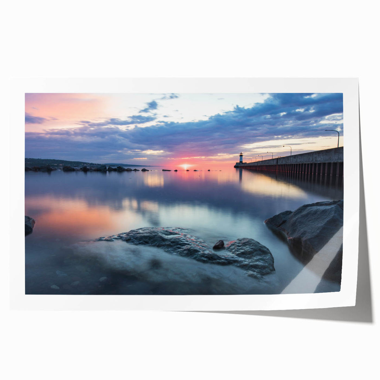 Rolled print of a Minnesota landscape featuring a serene lake and autumn trees in earthy tones.