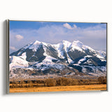 Framed canvas of a Montana landscape in vibrant colors, ideal for adding a vintage touch to any room.