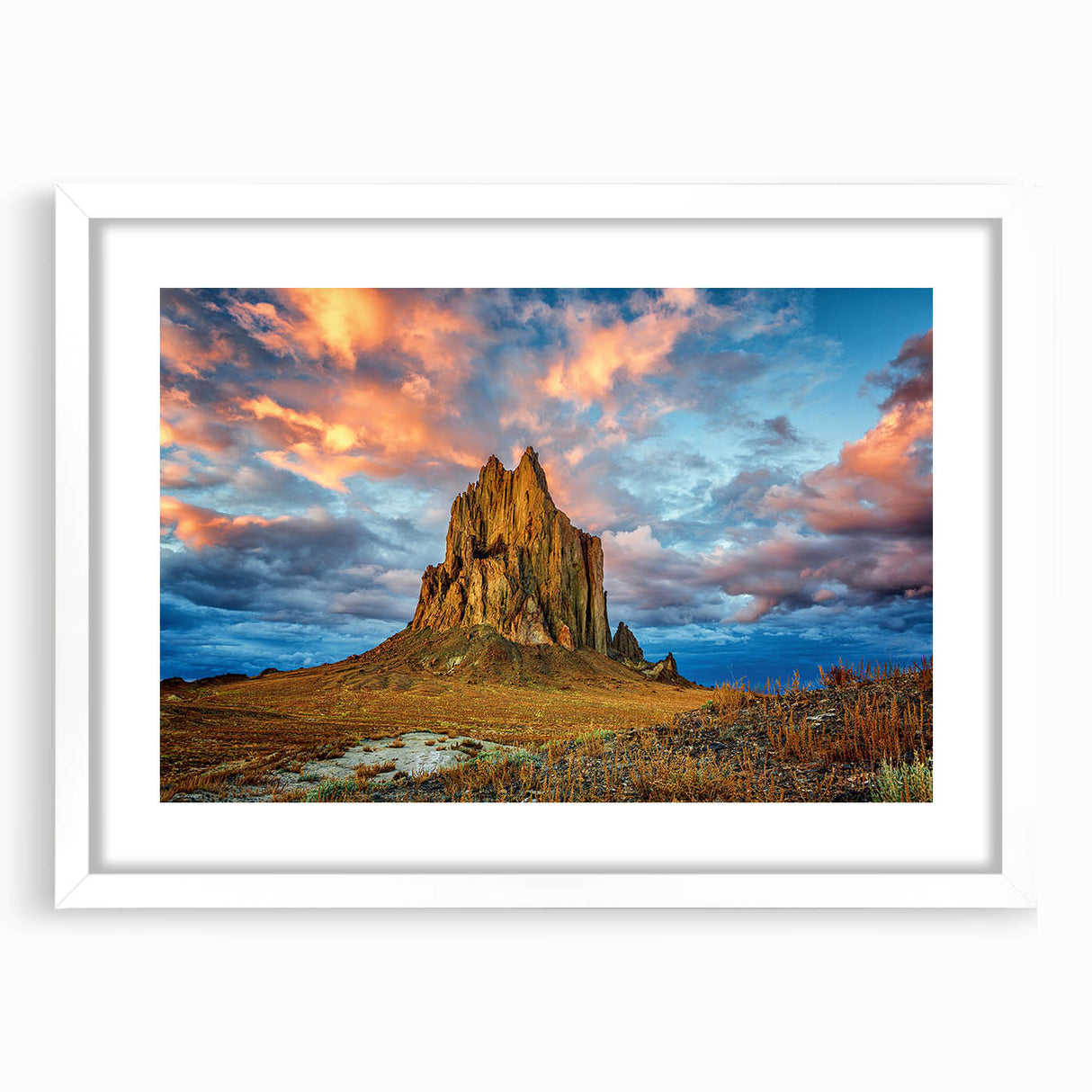 Abstract art print of New Mexico scenery in muted earth tones on a framed white matte canvas.