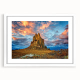 Abstract art print of New Mexico scenery in muted earth tones on a framed white matte canvas.
