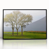 Large abstract wall art depicting the Outer Banks in muted blue and gray tones, acrylic print in a black frame.