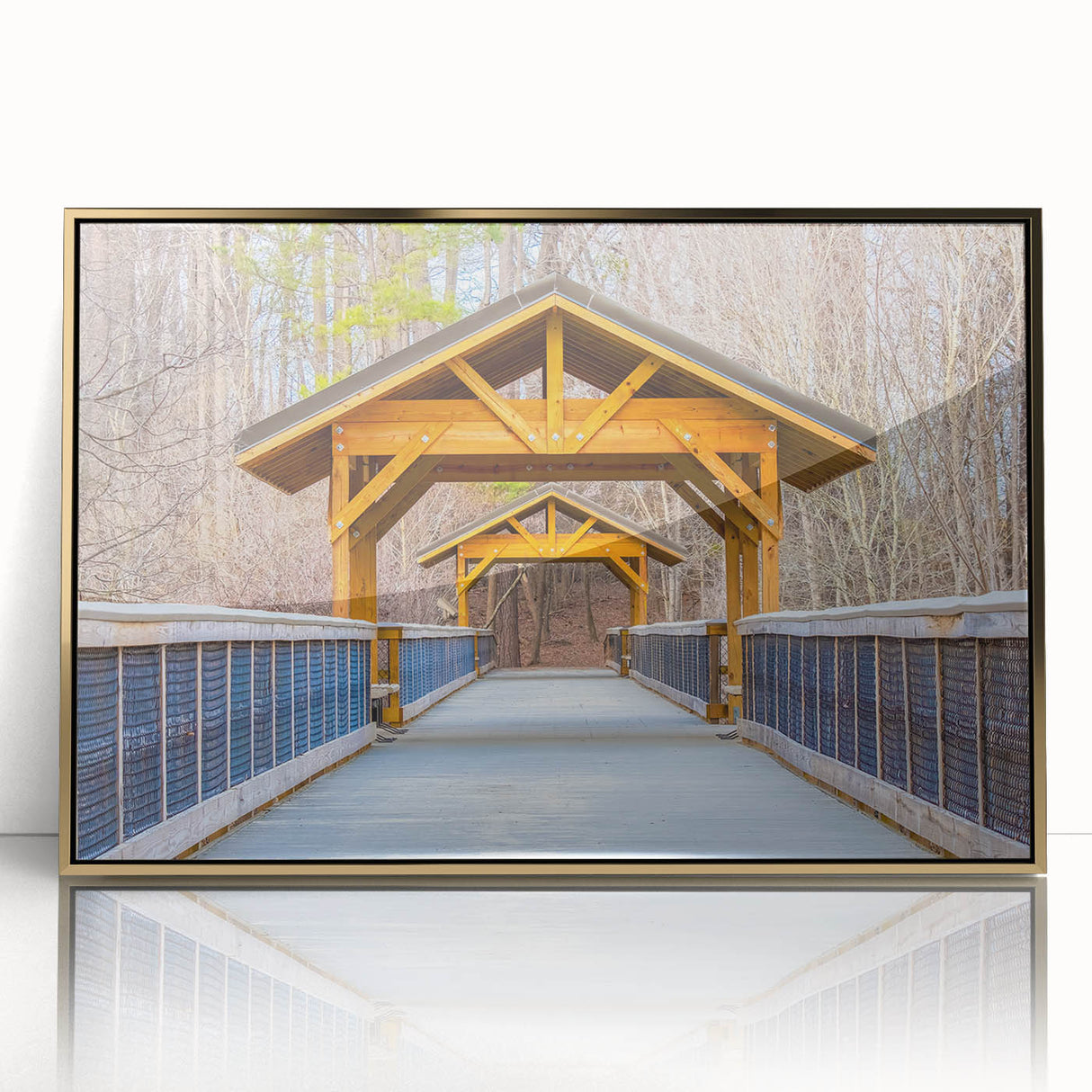 Raleigh skyline in muted gold and blue tones on a framed acrylic print, suitable for modern nursery decor.