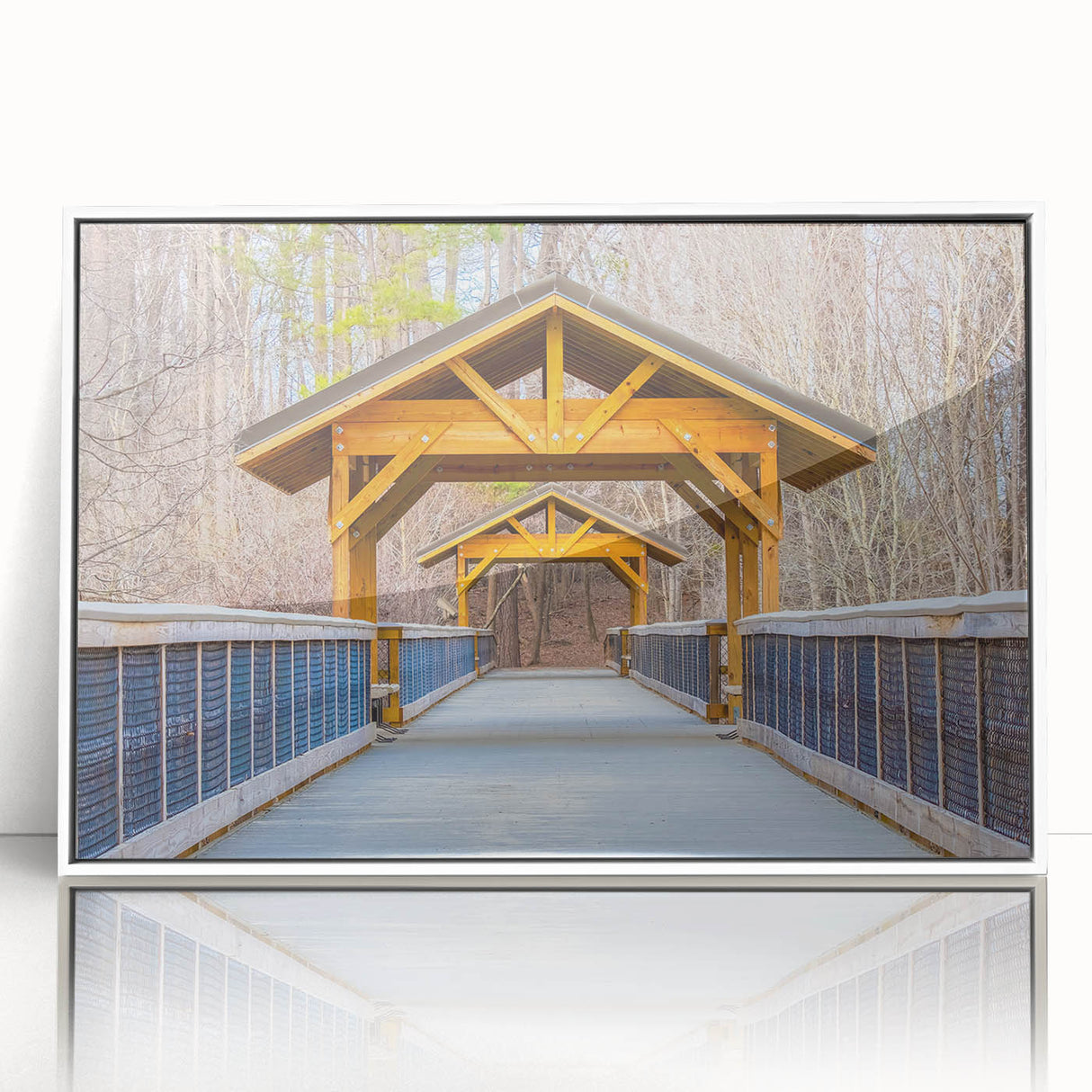 Acrylic print of Raleigh, North Carolina skyline in art deco style with muted blue and white tones.