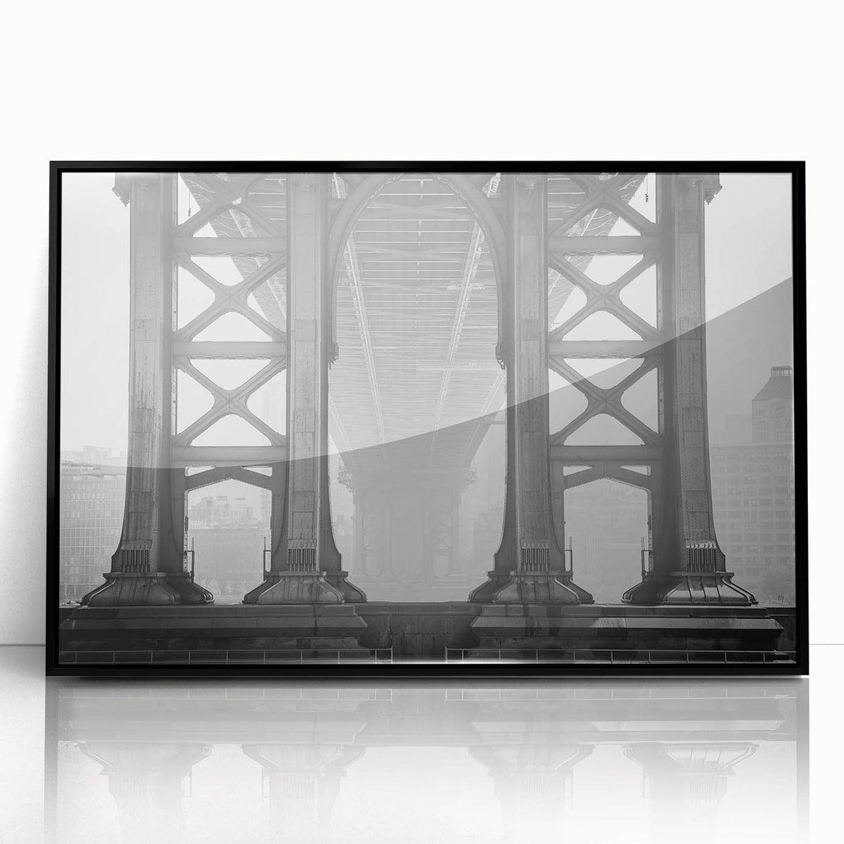 Large abstract wall art of the Brooklyn Bridge in muted gray and black tones on framed acrylic.