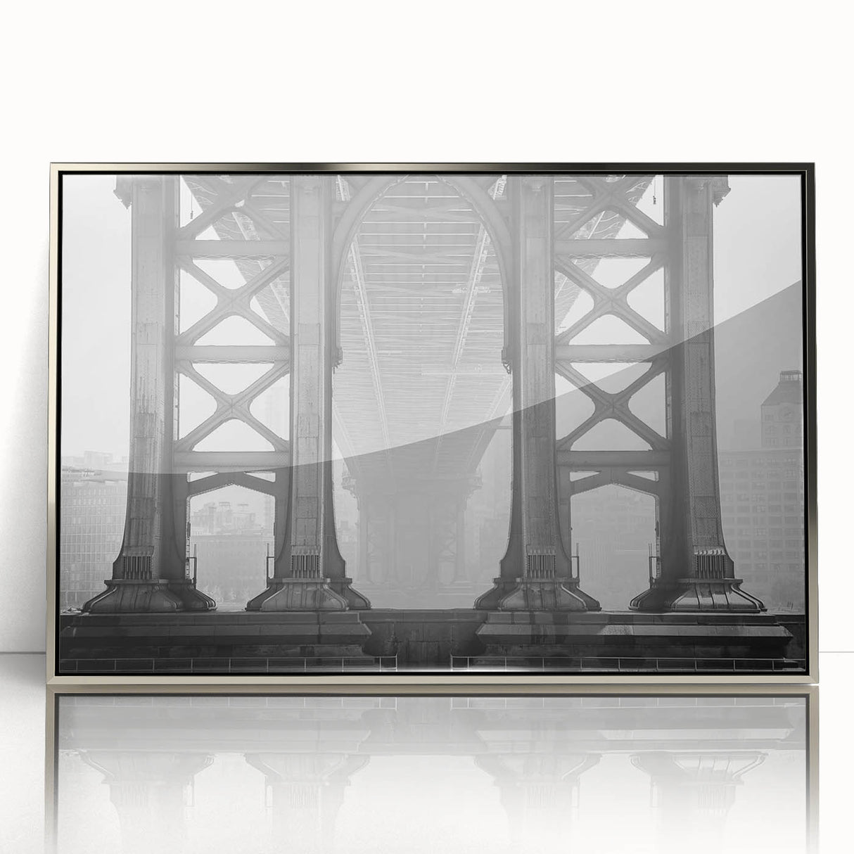Mid-century modernist art depicting the Brooklyn Bridge in muted gray and blue tones, acrylic print framed in silver.
