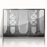 Mid-century modernist art depicting the Brooklyn Bridge in muted gray and blue tones, acrylic print framed in silver.