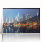 Mid-century modernist art depicting the Manhattan skyline in muted gray and blue tones on a framed acrylic print.