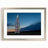 Textured abstract art print of Oklahoma scenery in muted earth tones, framed in silver, ideal for bedroom decor.