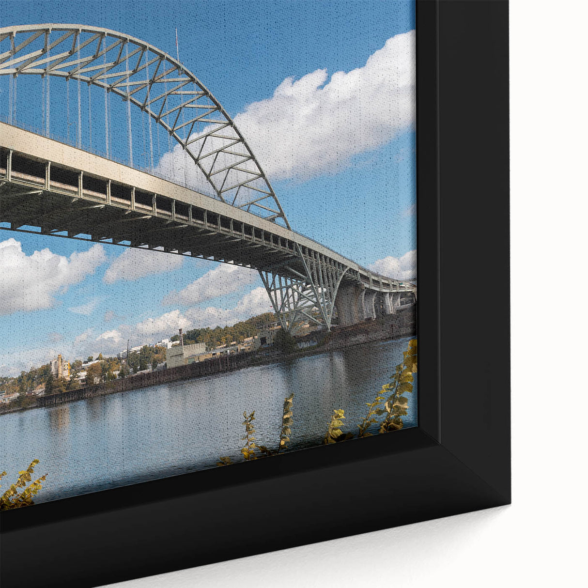 Close-up of a textured black wall art depicting Portland, Oregon scenery with colorful accents on a framed canvas.