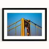 Abstract art print of Pittsburgh skyline in vibrant colors on a large framed canvas, ideal for living room decor.