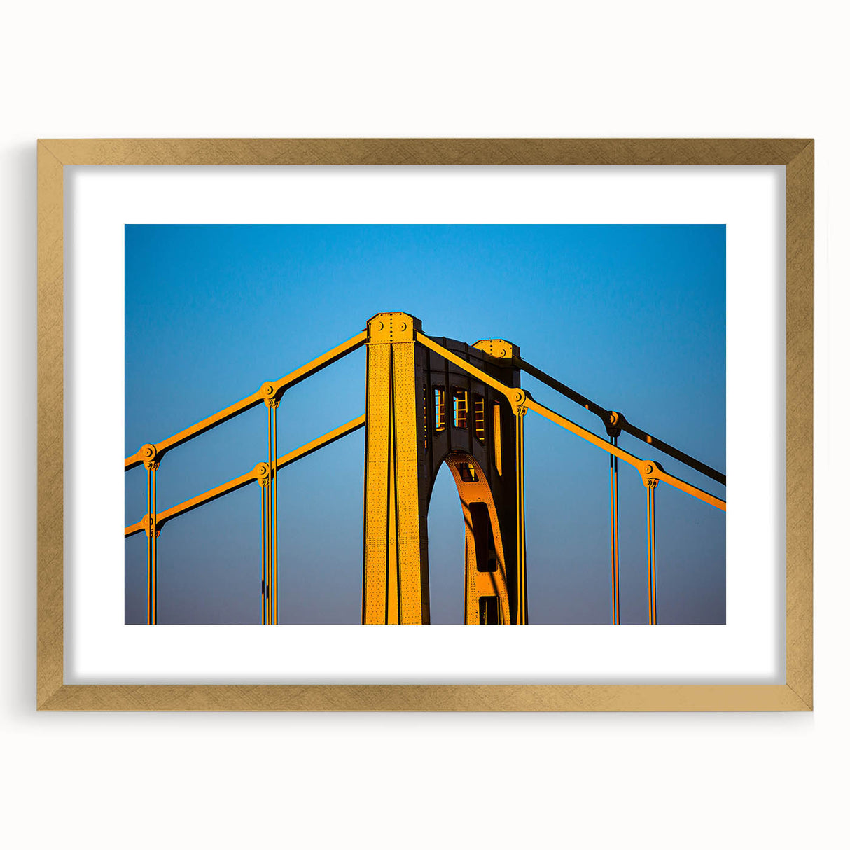 Extra large abstract art print of Pittsburgh skyline in muted grays and blues on a framed canvas.