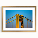 Extra large abstract art print of Pittsburgh skyline in muted grays and blues on a framed canvas.