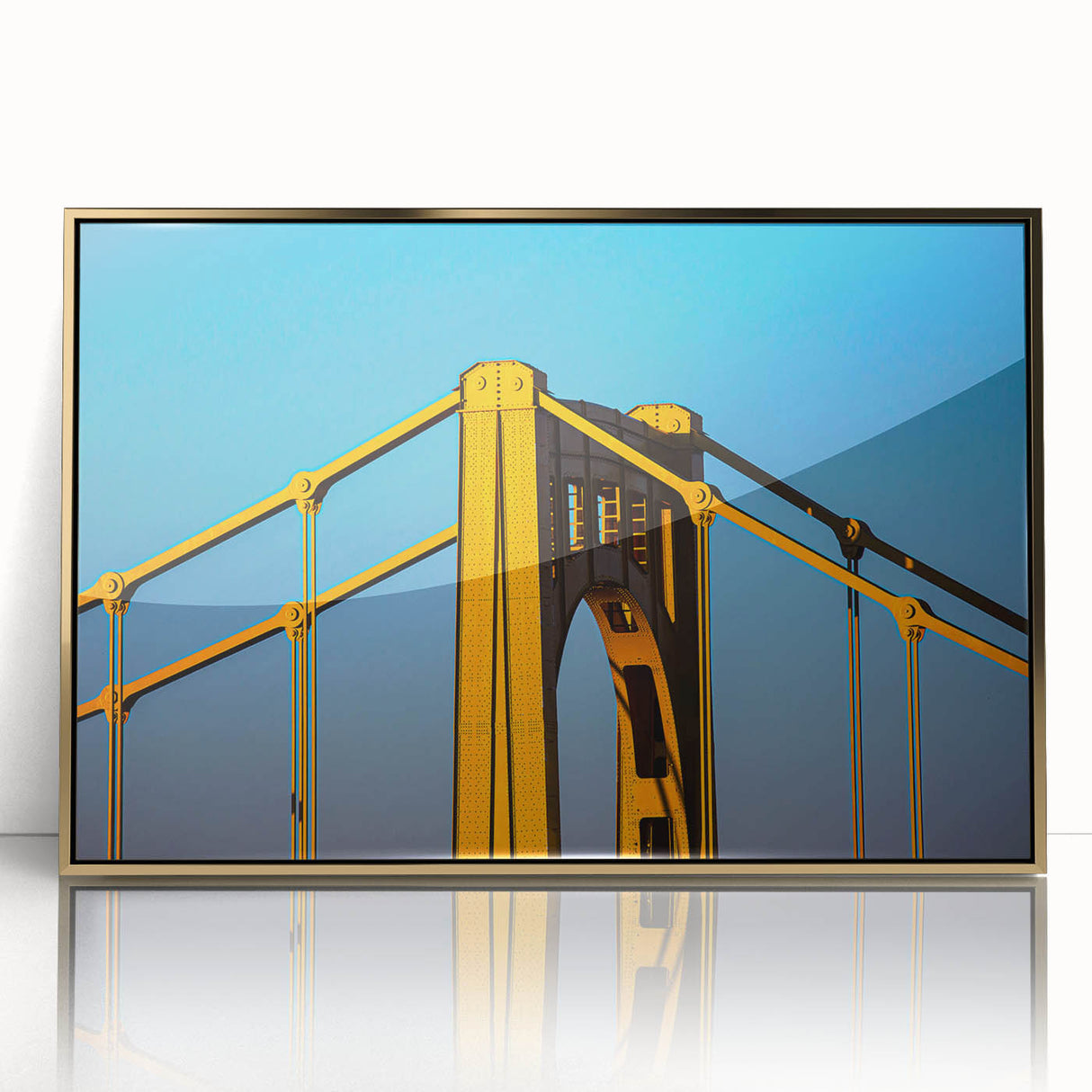 Acrylic print of Pittsburgh skyline in gold and blue tones, framed, mid-century modernist style.