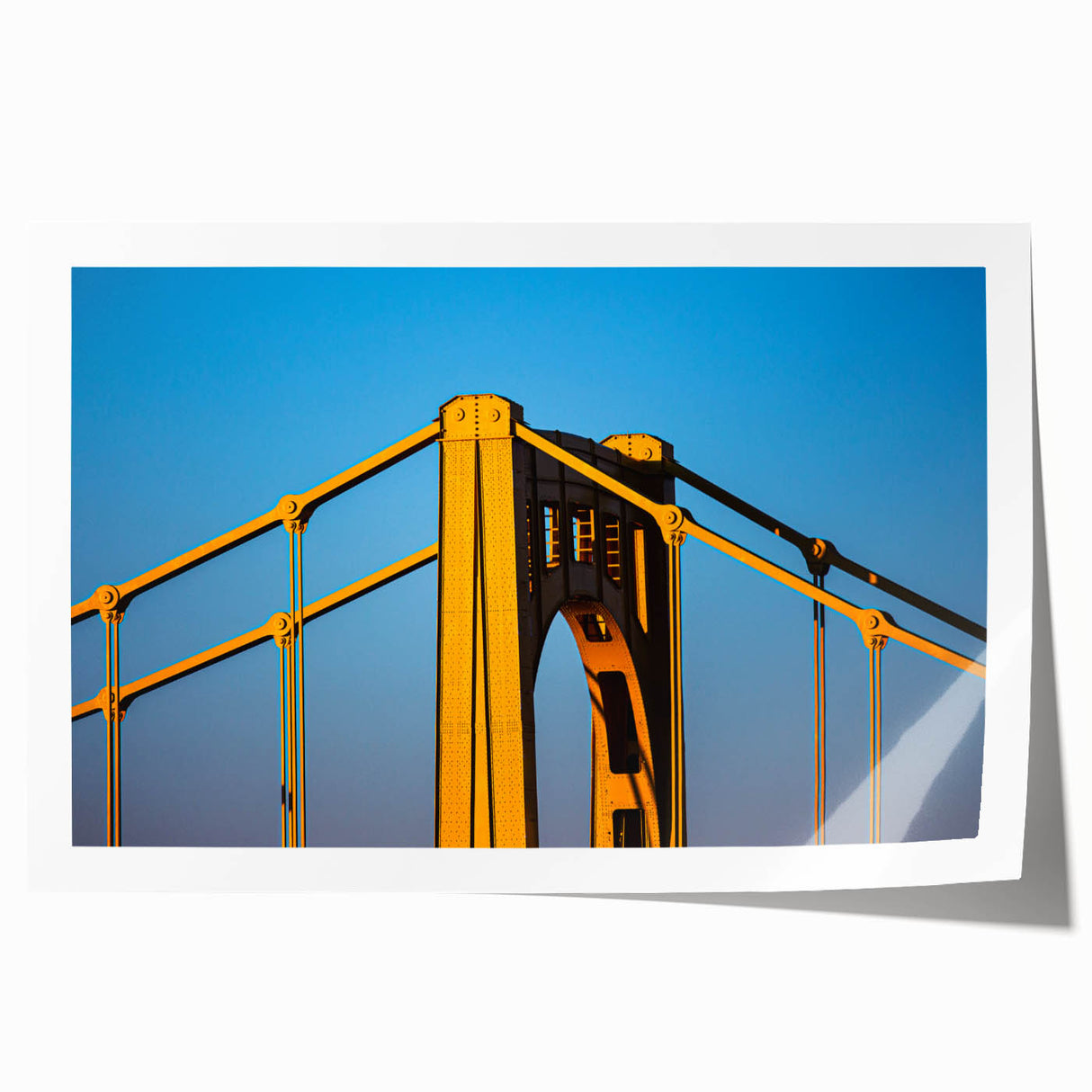 Panoramic view of Pittsburgh skyline in muted gray and blue tones on a rolled canvas, suitable for dining room wall art.