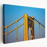 Panoramic view of Pittsburgh skyline on large stretched canvas, featuring muted earth tones, suitable for kitchen wall art.