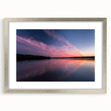 Textured abstract art print featuring muted earth tones on a framed silver canvas, suitable for bedroom decor.