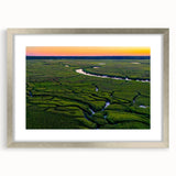 Textured art print of Charleston scenery in abstract style, showcased in a silver frame with mat, suitable for bedroom decor.