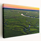 Side view of a stretched canvas depicting Charleston, South Carolina scenery in muted earth tones.