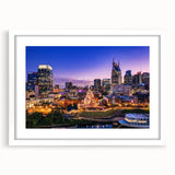 Abstract art print of Nashville skyline in muted gray and blue tones on a framed white mat, ideal for dining room decor.
