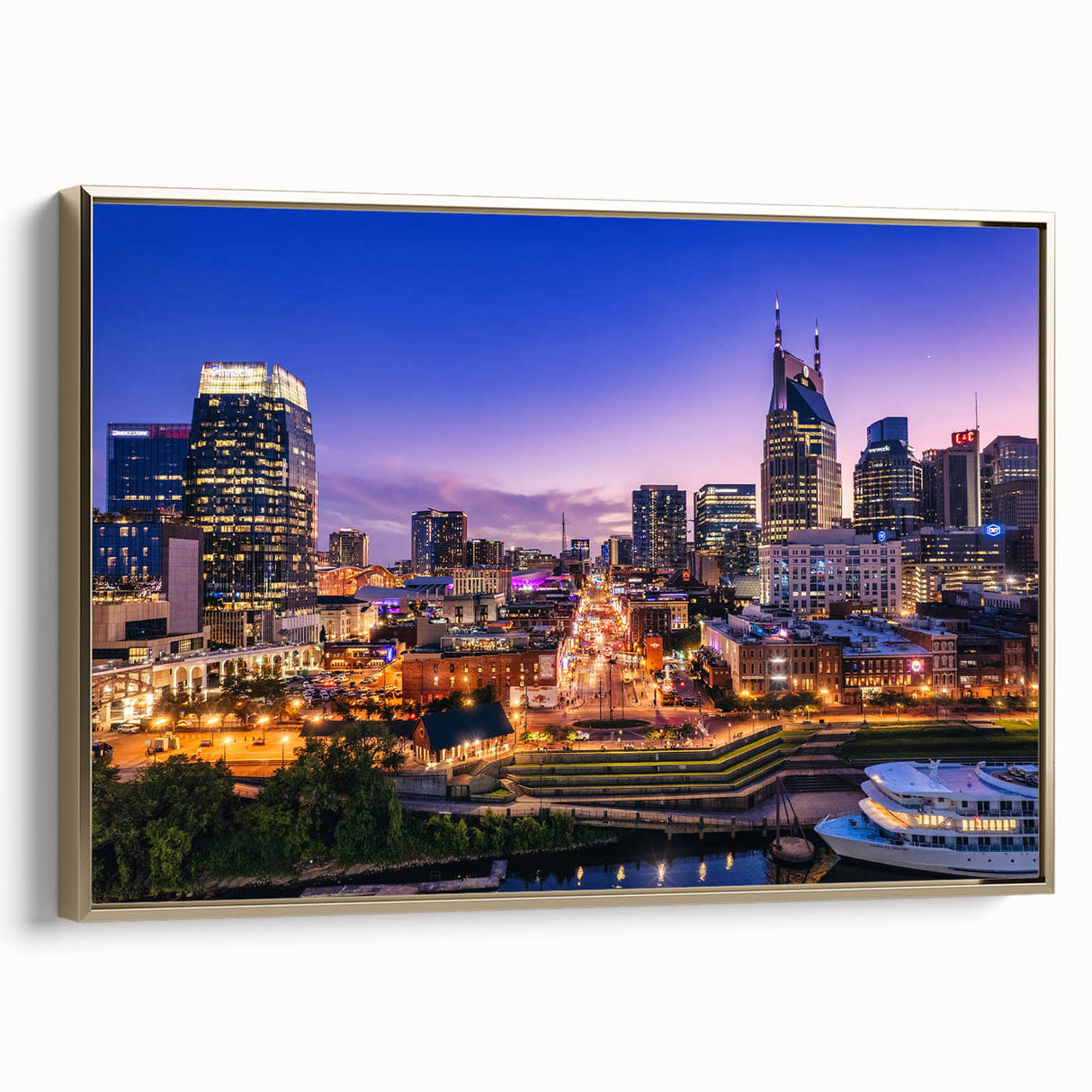 Framed canvas of Nashville skyline in vintage poster style, featuring black and gold tones, ideal for bedroom wall art.