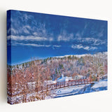 Large stretched canvas depicting a serene Vermont landscape in muted green and blue tones, ideal for kitchen wall art.