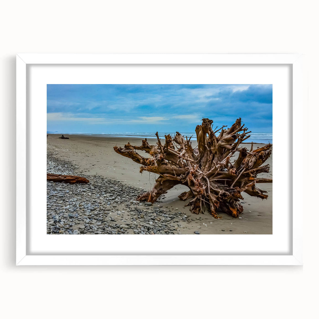 Abstract art print of Olympic National Park in muted green and blue tones, framed with a white mat.