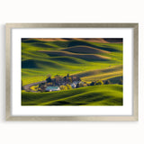 Textured art of abstract Palouse scenery in muted greens and browns on a framed silver mat, suitable for bedroom decor.