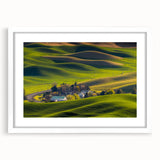 Abstract art print of Palouse, Washington, featuring rolling hills in muted green and yellow tones on a white-framed canvas.