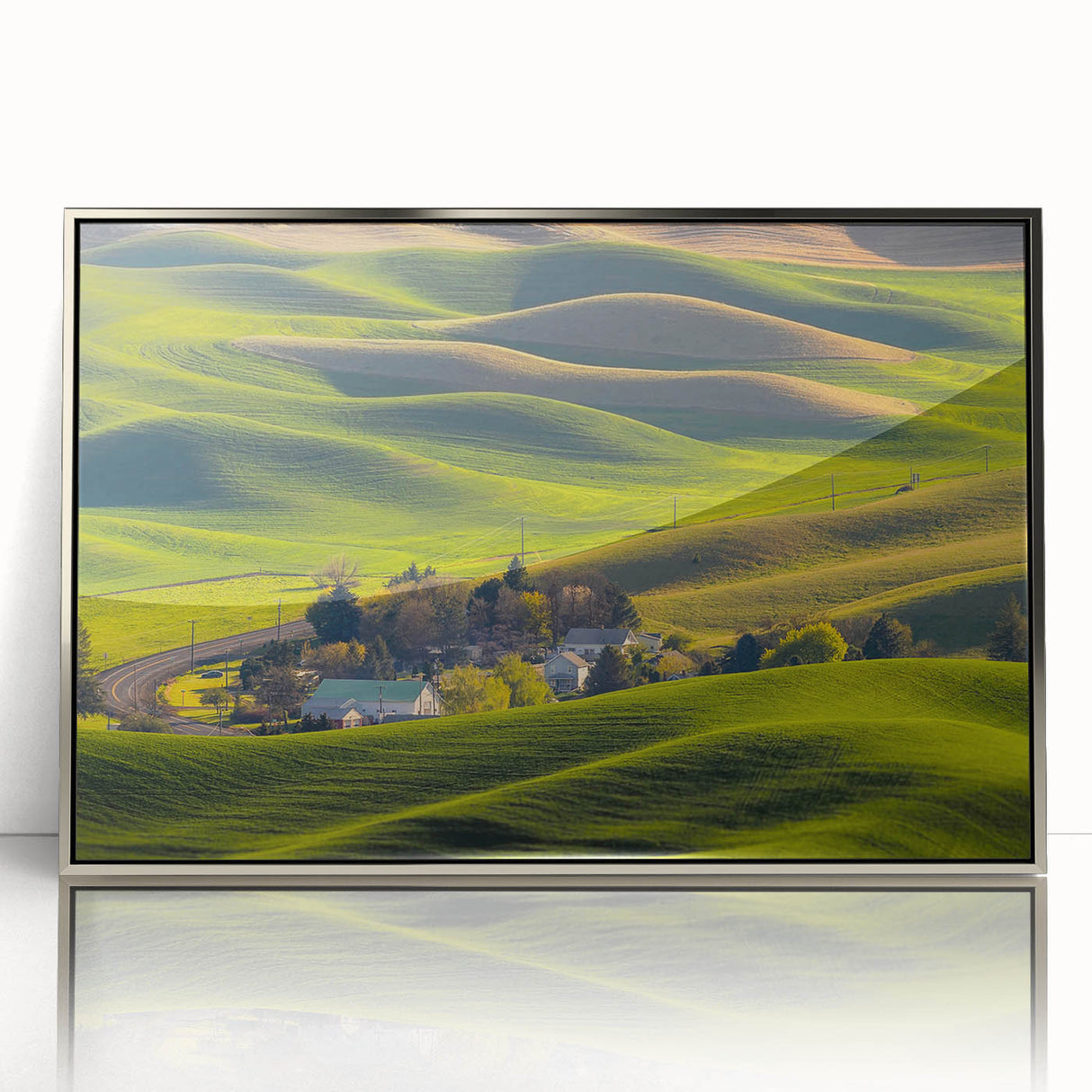 Mid-century modernist art depicting the rolling hills of the Palouse in muted earth tones on a framed acrylic print.