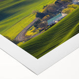 Art deco poster of the Palouse fields in muted green and brown hues on rolled canvas, suitable for dining room decor.