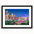 Abstract art print of Seattle skyline in vibrant colors on a large textured canvas, suitable for living room decor.