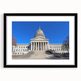 Textured abstract art print of colorful, swirling patterns, framed in black, ideal for living room decor.