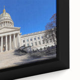 Close-up of textured black wall art depicting a West Virginia scenery on a framed canvas, with colorful accents.