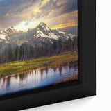 Framed canvas of the Grand Tetons in Wyoming featuring textured black silhouettes with colorful sunset.