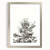 Textured art featuring abstract winter scene in muted blue and white tones on a framed silver mat, ideal for bedroom art.