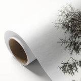 Art Deco poster featuring a winter scene on rolled canvas, with muted blue and white tones, ideal for nursery wall art.