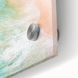 Large abstract wall art in vibrant blues and oranges on acrylic glass.