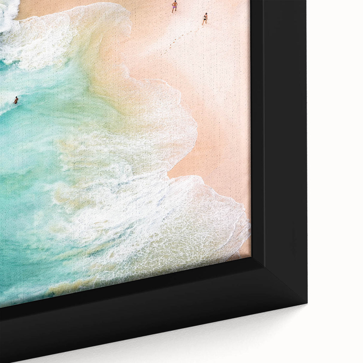 Close-up of extra large black wall art featuring colorful, textured abstract design on framed canvas.