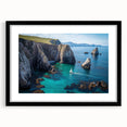 Framed landscape artwork of dramatic cliffs in a black mat, showcasing natural beauty and elegance, perfect for enhancing modern home decor.