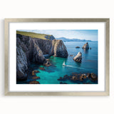 Framed landscape artwork depicting rugged cliffs in a silver frame with a mat, showcasing intricate details and textures, perfect for home decor.
