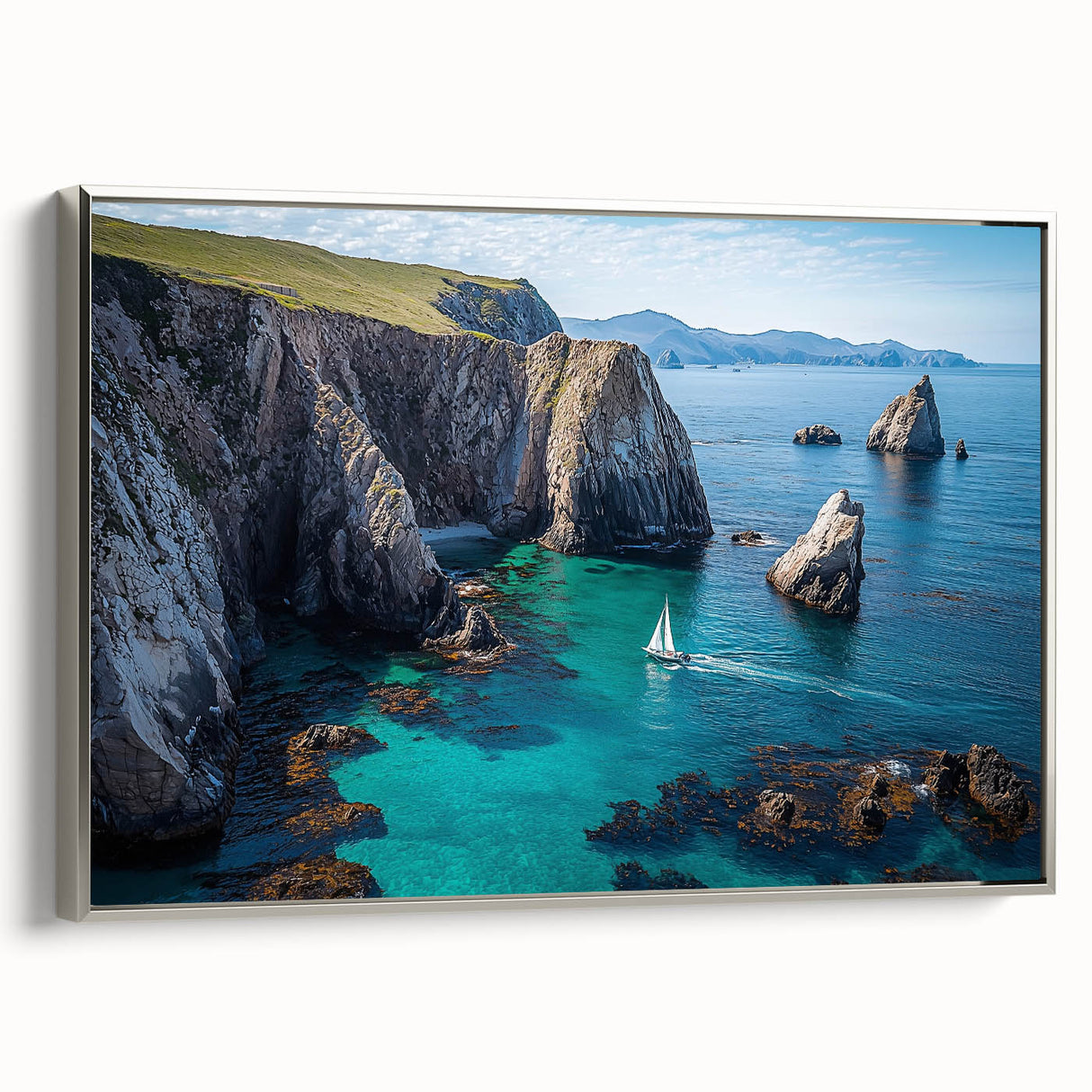 Framed canvas artwork depicting a scenic landscape of dramatic cliffs, showcasing a silver side view finish, ideal for modern home decor and art enthusiasts.