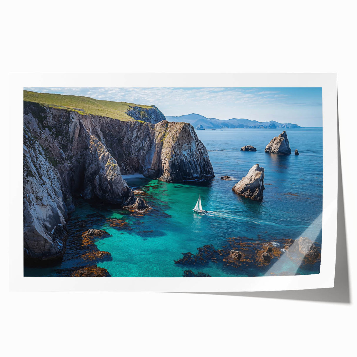 Stunning landscape print showcasing dramatic cliffs against a vibrant sunset, rolled and ready for framing, perfect for enhancing home decor with natural beauty.