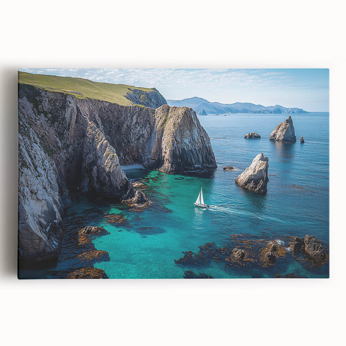 Stretched canvas artwork depicting a stunning landscape of towering cliffs under a vibrant sky, perfect for home decor or a nature-inspired theme.