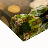 Close-up of vibrant abstract floral wall art on stretched canvas, showcasing bold colors and intricate details, perfect for modern home decor.