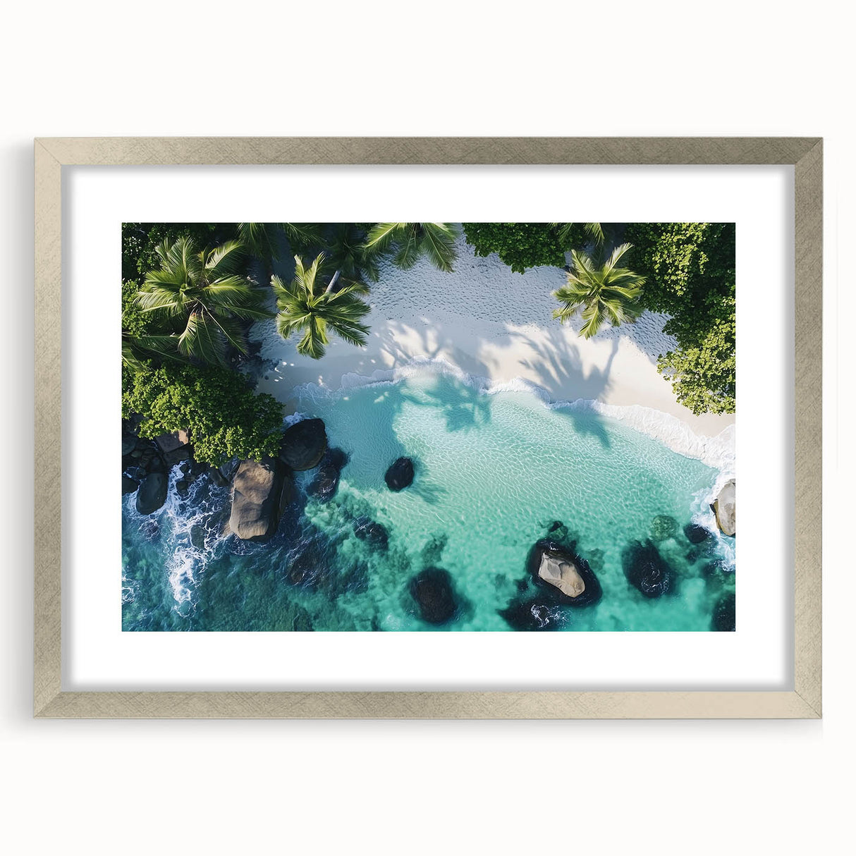Silver-framed landscape artwork depicting serene beaches with soft waves and golden sand, elegantly matted for a polished look, ideal for home decor.