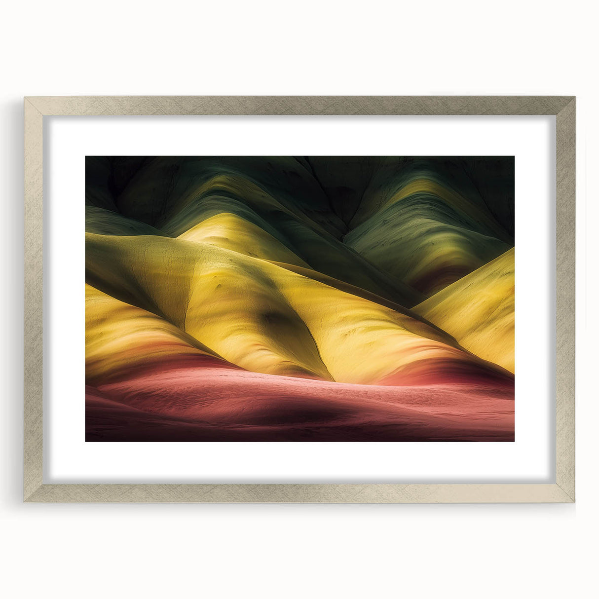 Silver-framed landscape artwork showcasing a stunning canyon view, complete with a mat for an elegant presentation, perfect for home decor or office styling.