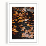 Abstract art print featuring swirling autumn colors on a white framed canvas, ideal for dining room decor.