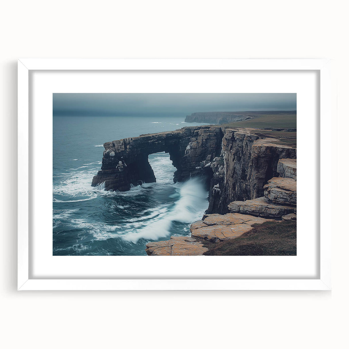 Framed landscape artwork depicting dramatic cliffs and a serene ocean view, showcased with a white mat for a modern touch, perfect for enhancing home decor.