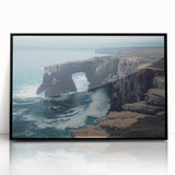 Framed acrylic artwork depicting dramatic cliffs and landscapes, featuring a sleek black frame that enhances the vibrant colors and intricate details of the scene. Perfect for modern home decor, this piece adds a touch of nature-inspired elegance to any room.