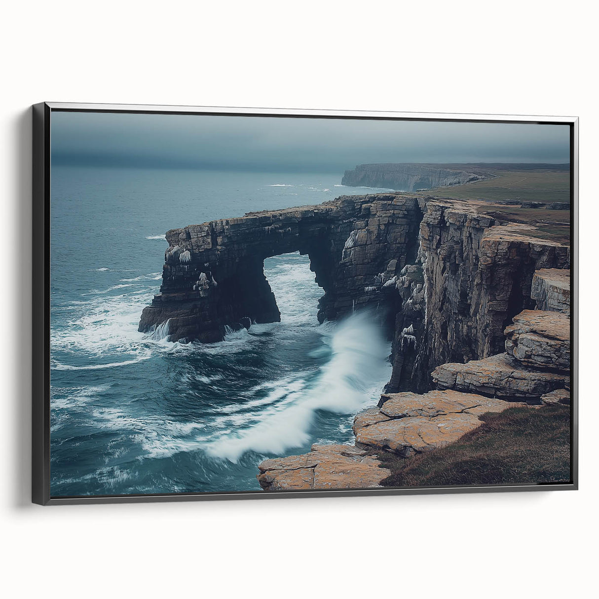 Framed canvas artwork depicting a dramatic cliff landscape, showcasing rich colors and intricate details, with a sleek black frame enhancing its elegance. Ideal for modern home decor.